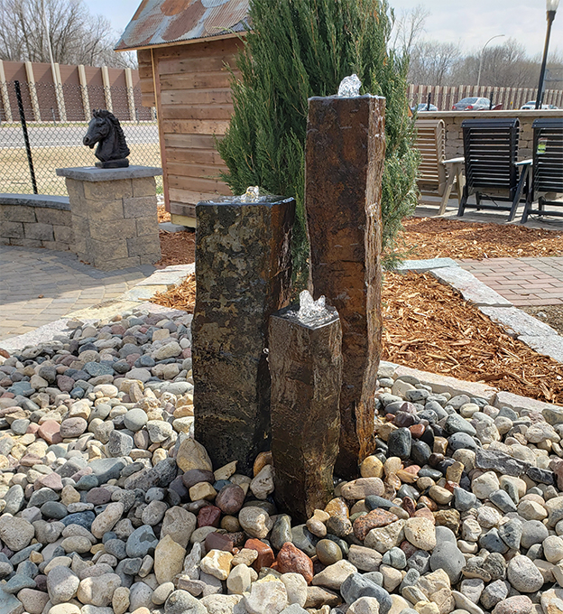 Add a striking basalt fountain to your yard.